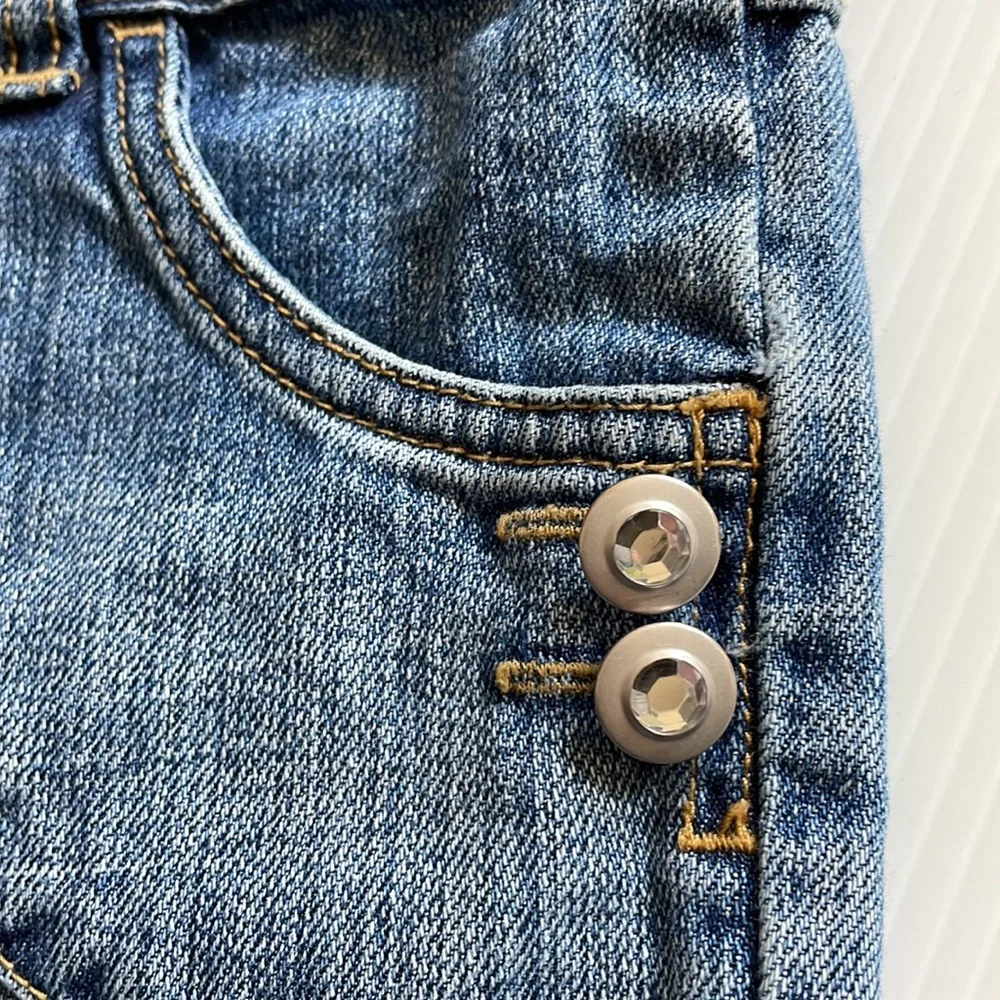 Gymboree flared jeans with gem buttons.  Girls size 7